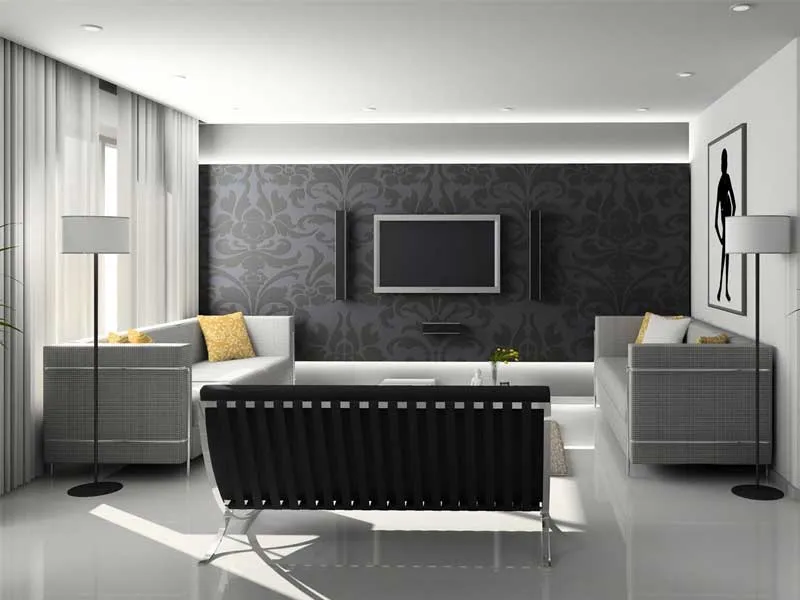 A bright, modern living room with grey sofas and a feature wall